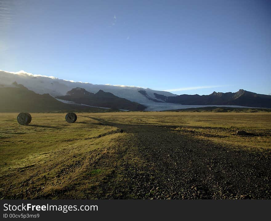 Straw bales and glacier