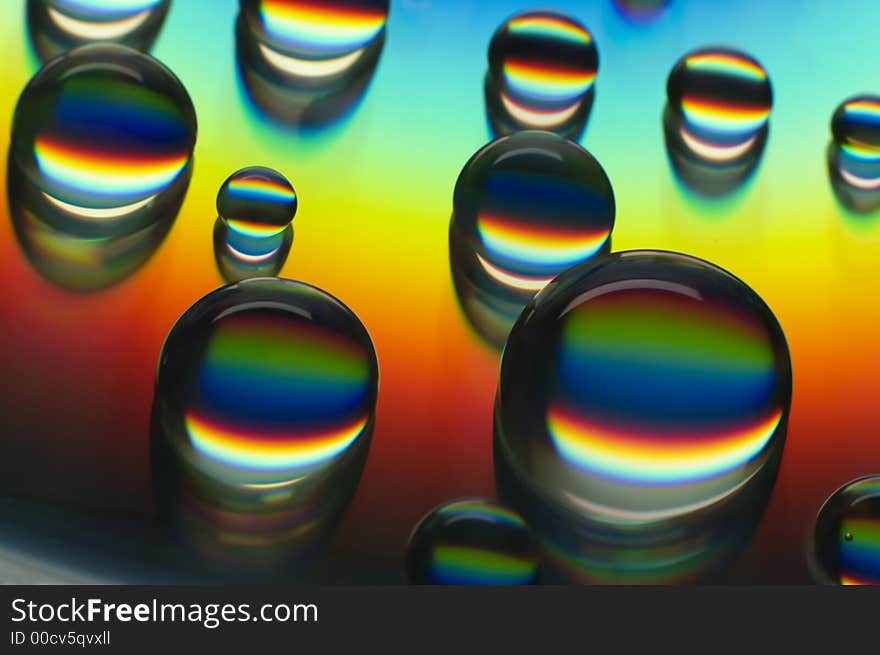 Water drops on compact disc close up