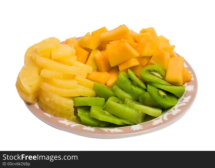 Isolated tray of Kiwi, Pineapple and cantaloupe. Isolated tray of Kiwi, Pineapple and cantaloupe