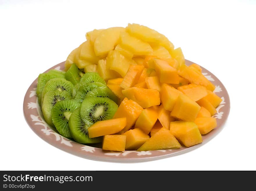 Isolated tray of Kiwi, Pineapple and cantaloupe. Isolated tray of Kiwi, Pineapple and cantaloupe