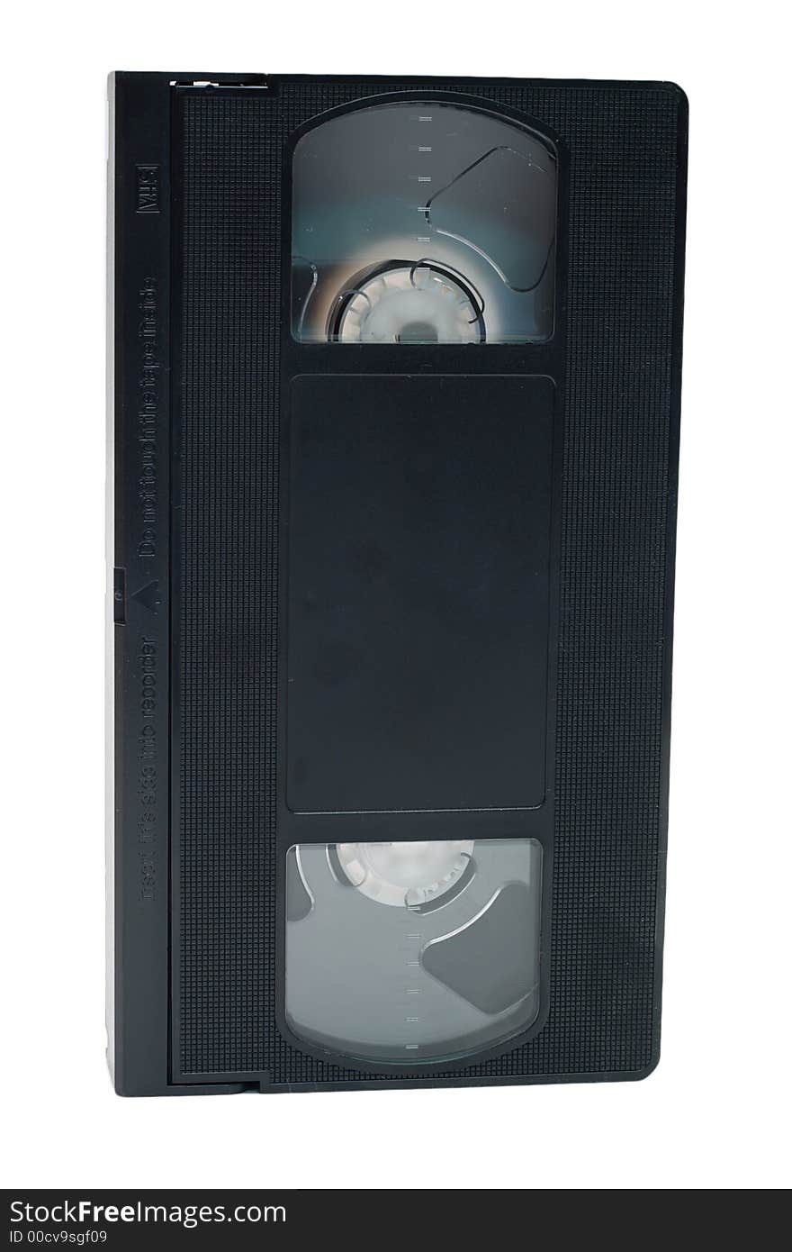 An obsolete black video tape isolated on a white background. An obsolete black video tape isolated on a white background