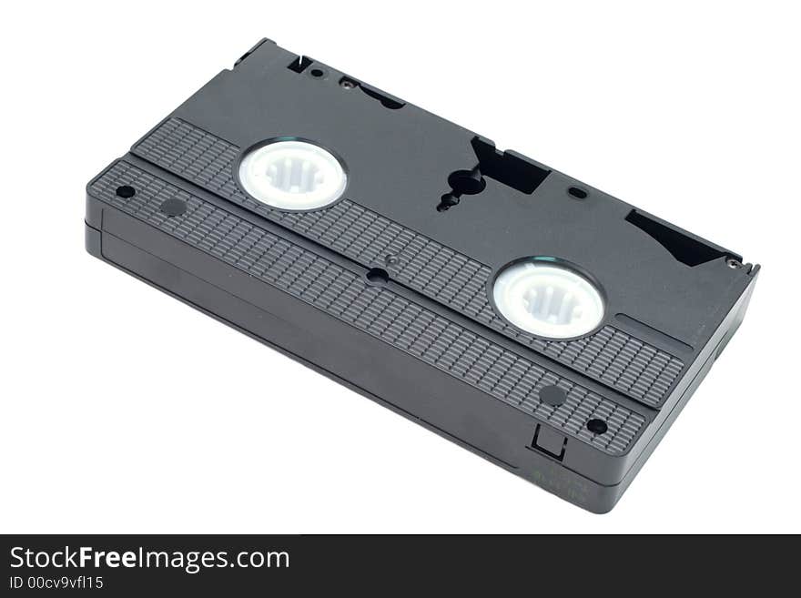 An obsolete black video tape isolated on a white background. An obsolete black video tape isolated on a white background