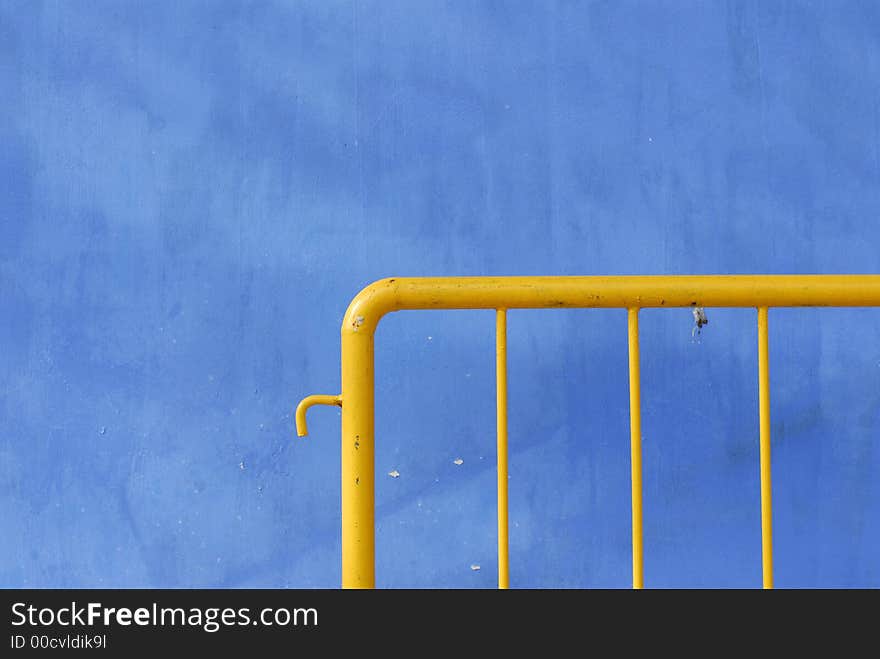 A blue walls and a barrier