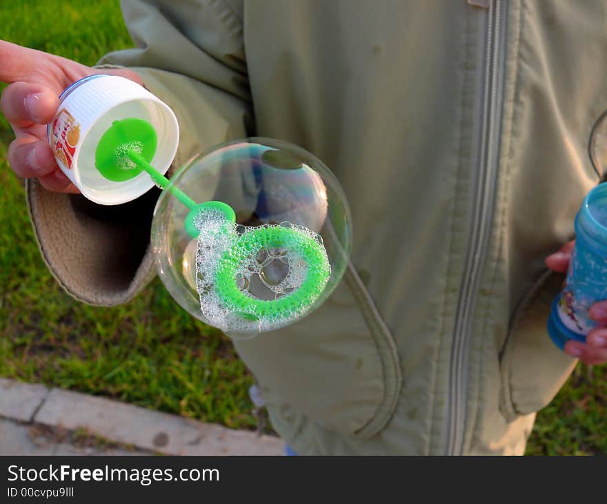 Sunset bubbles... Girl blow soap bubbles, very happy time. Sunset bubbles... Girl blow soap bubbles, very happy time...