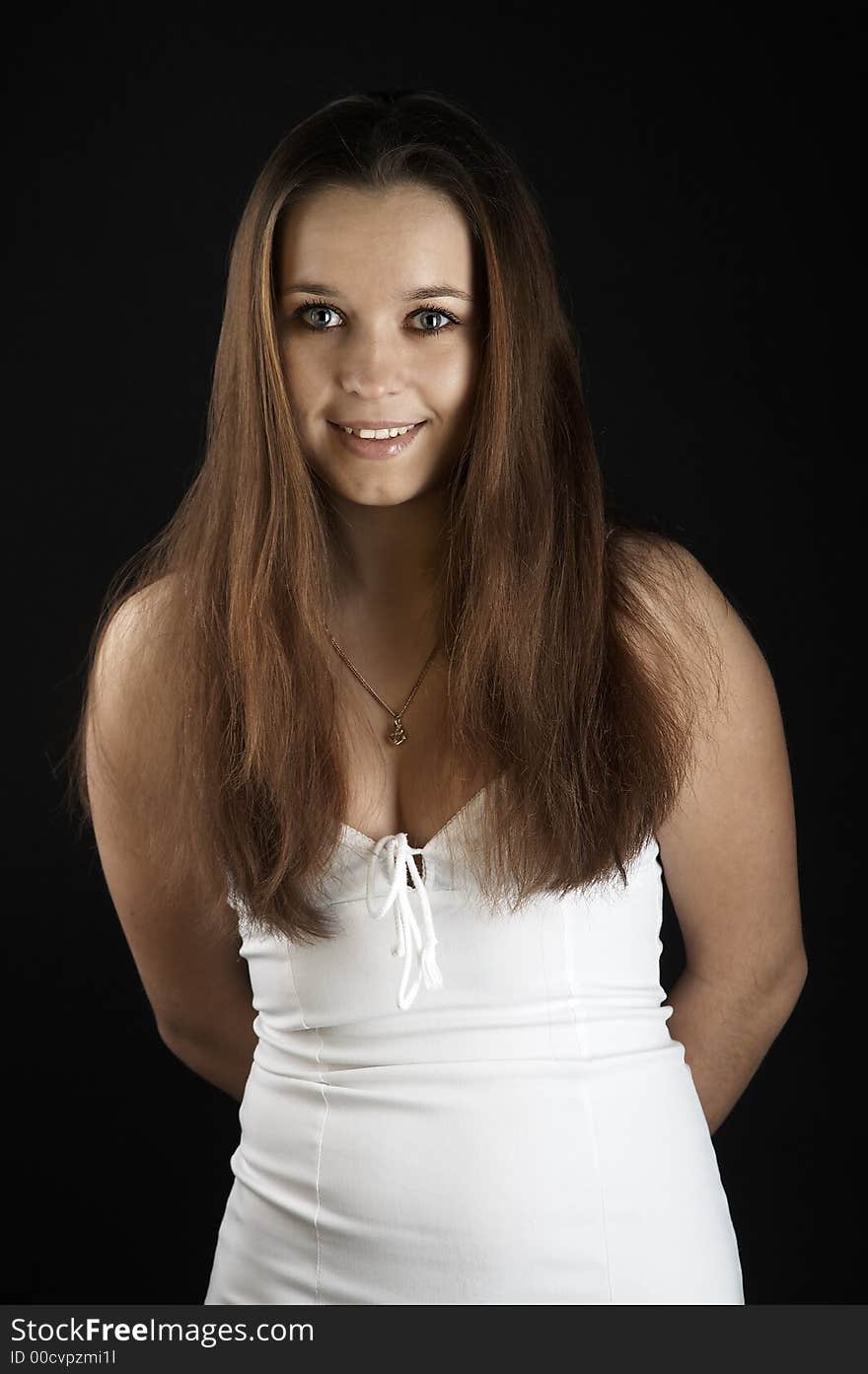 Girl in white dress on black background. Girl in white dress on black background