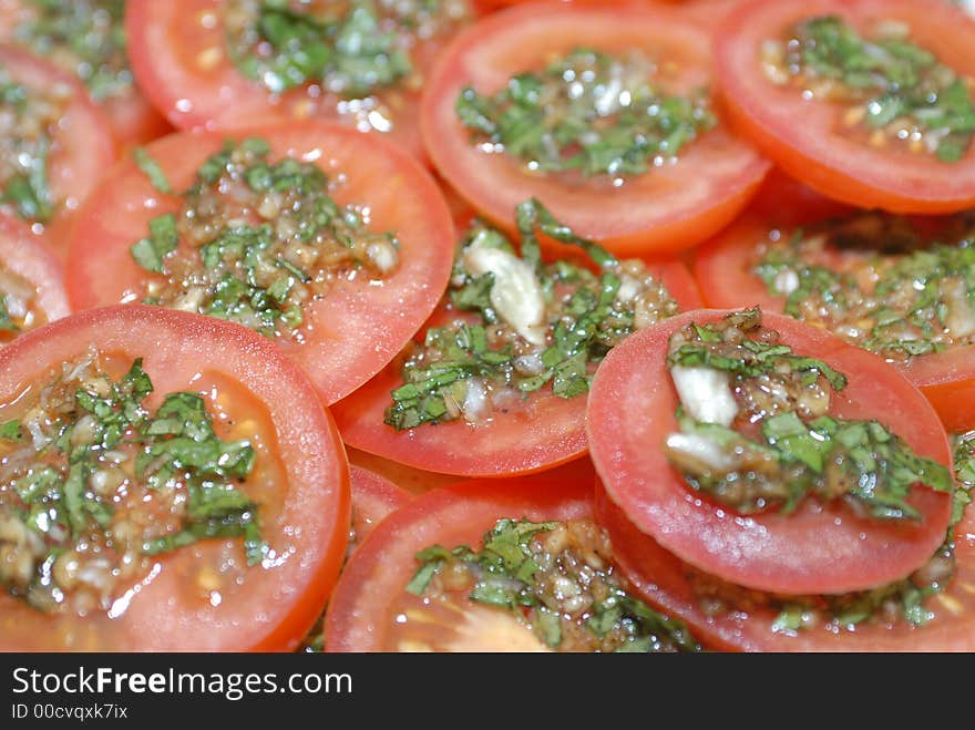 Fresh vegetable salad with tomatoes, basil and garlic. Fresh vegetable salad with tomatoes, basil and garlic