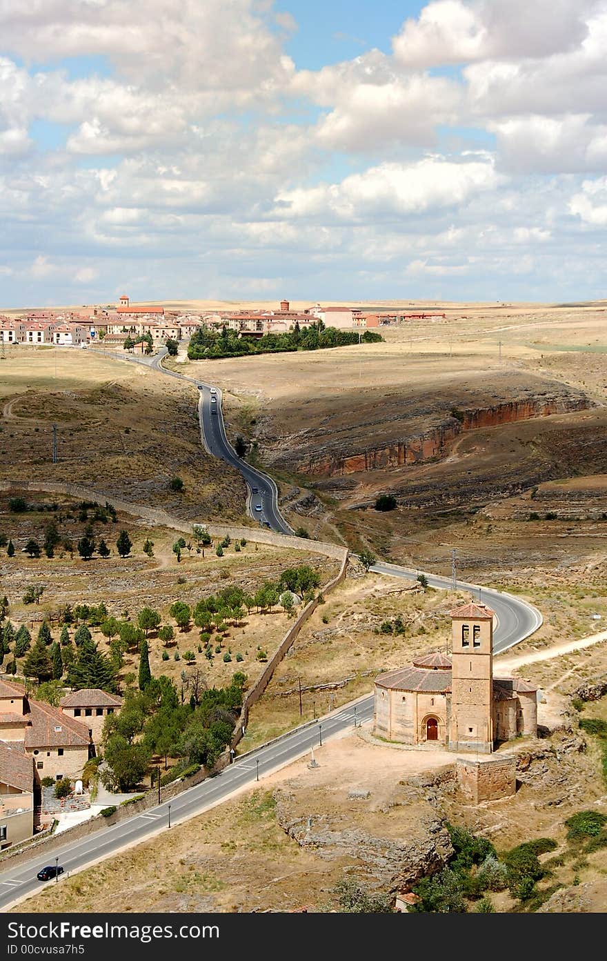 General sight from Segovia (Spain) with winding road and the Church of Vera Cruz. General sight from Segovia (Spain) with winding road and the Church of Vera Cruz.