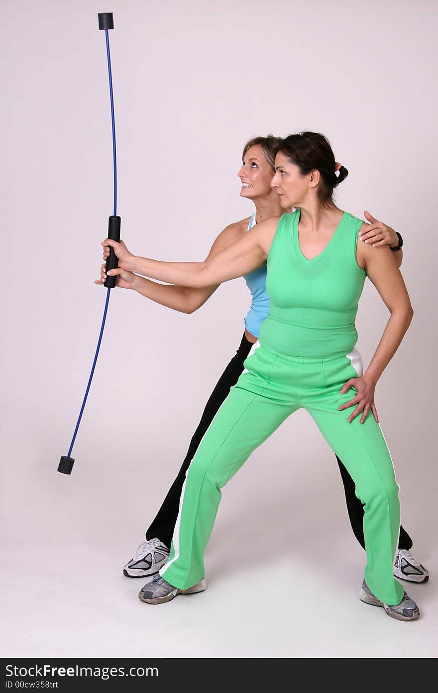 Two girl practicing with power-swing