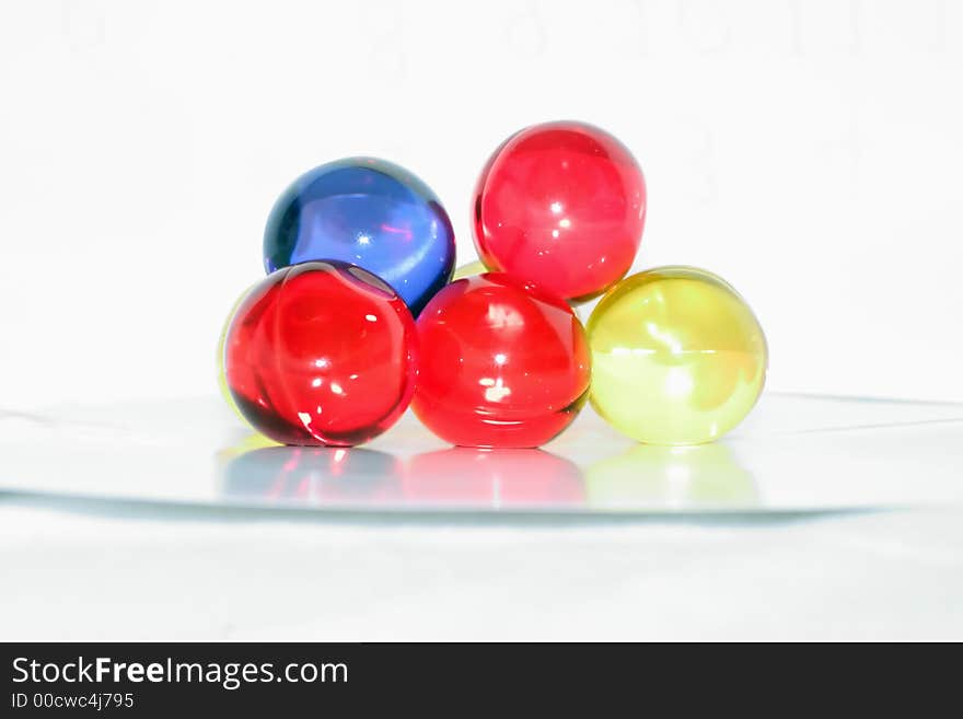 Blue red yellow spheres on a white background. Blue red yellow spheres on a white background