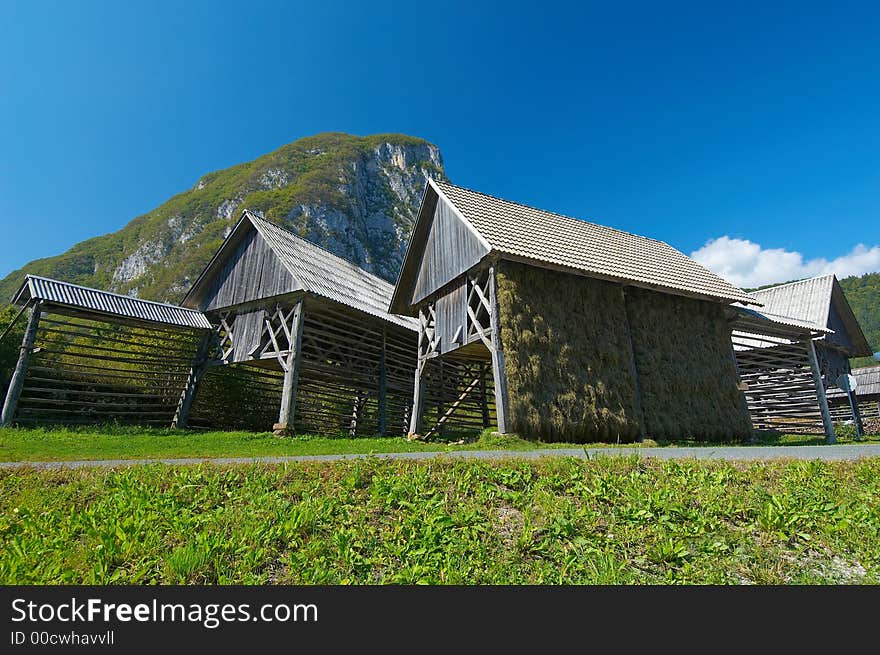 Group of old wooden barns near lake Bohinj in Slovenia