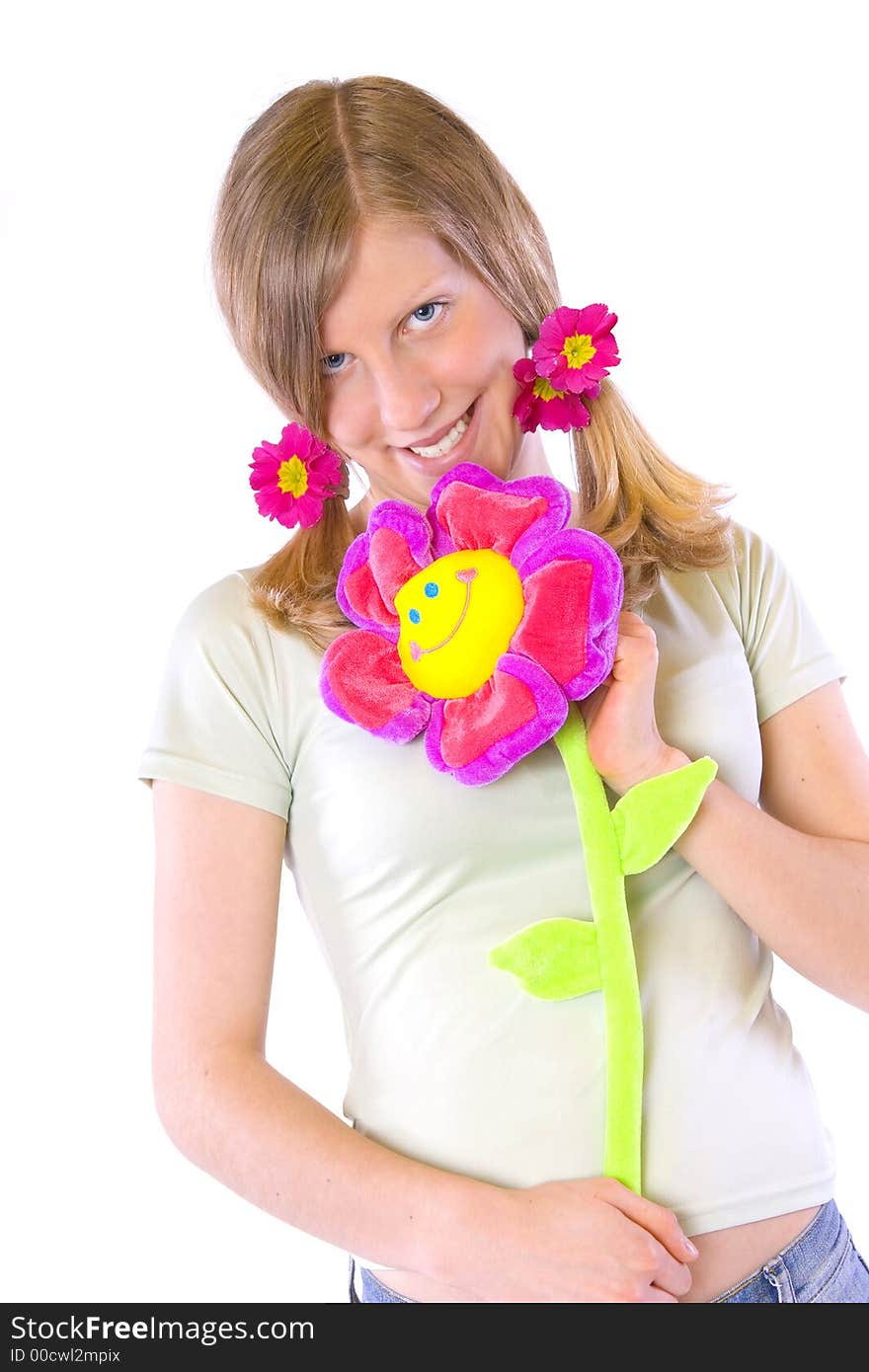 Beautiful girl holding a big colorful fower. Beautiful girl holding a big colorful fower.