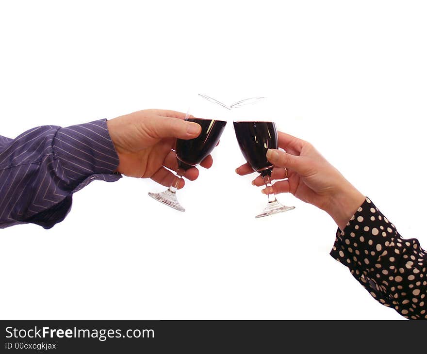 Couple touching glasses of red red wine