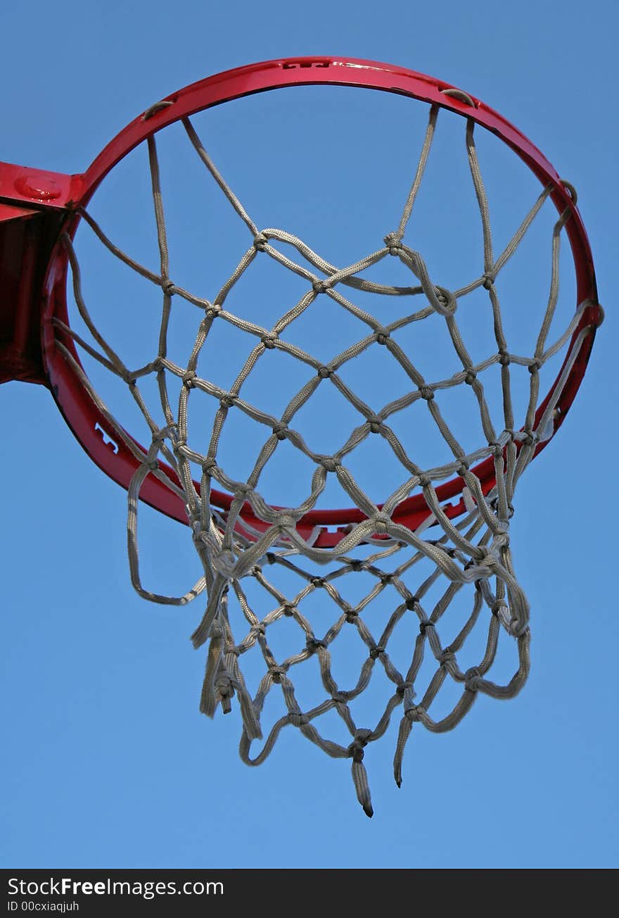 Close up of basketball net on blue background. Close up of basketball net on blue background