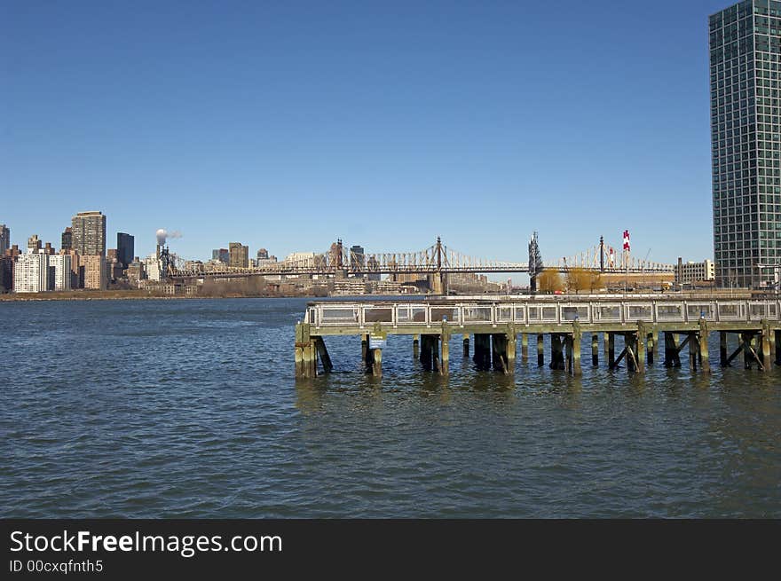 The Queensboro (59th Street) Bridge between Queens and Manhattan, NYC. The Queensboro (59th Street) Bridge between Queens and Manhattan, NYC