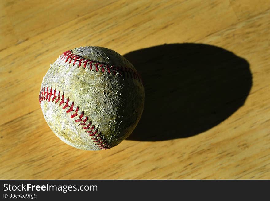 Detail closeup of a worn baseball