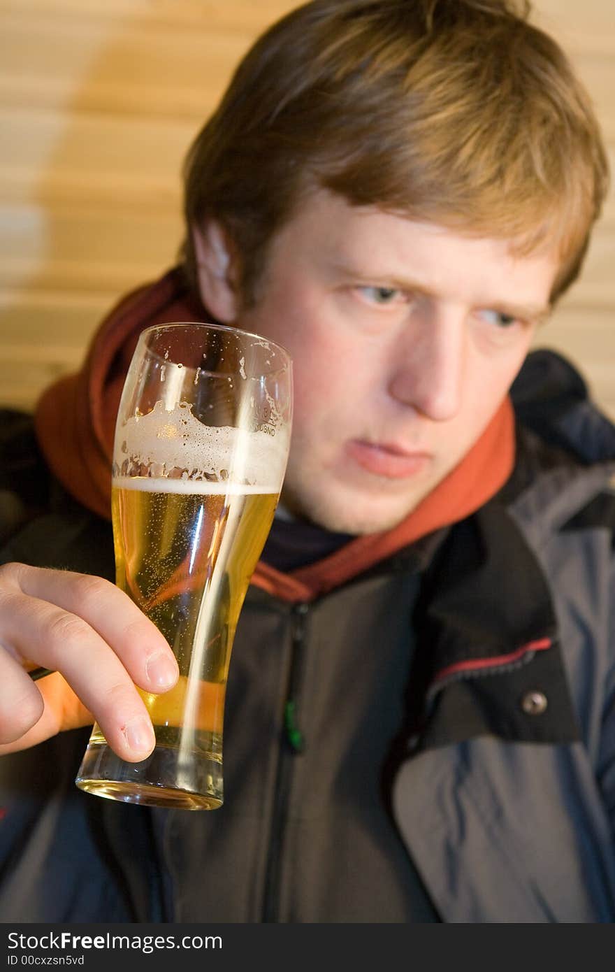 Man with beaker of beer. Man with beaker of beer.