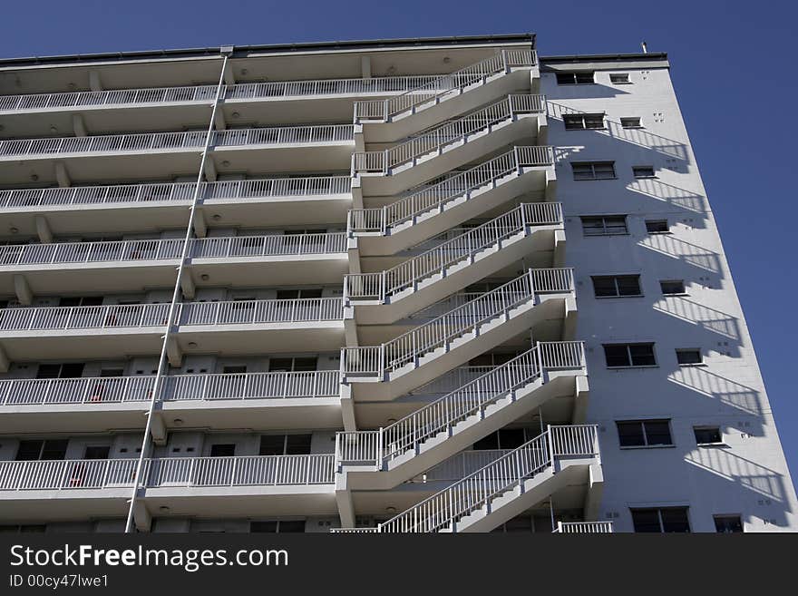 Modern Tall White Urban Residential Apartment Building In Sydney, Stairs, Staircase, Australia. Modern Tall White Urban Residential Apartment Building In Sydney, Stairs, Staircase, Australia