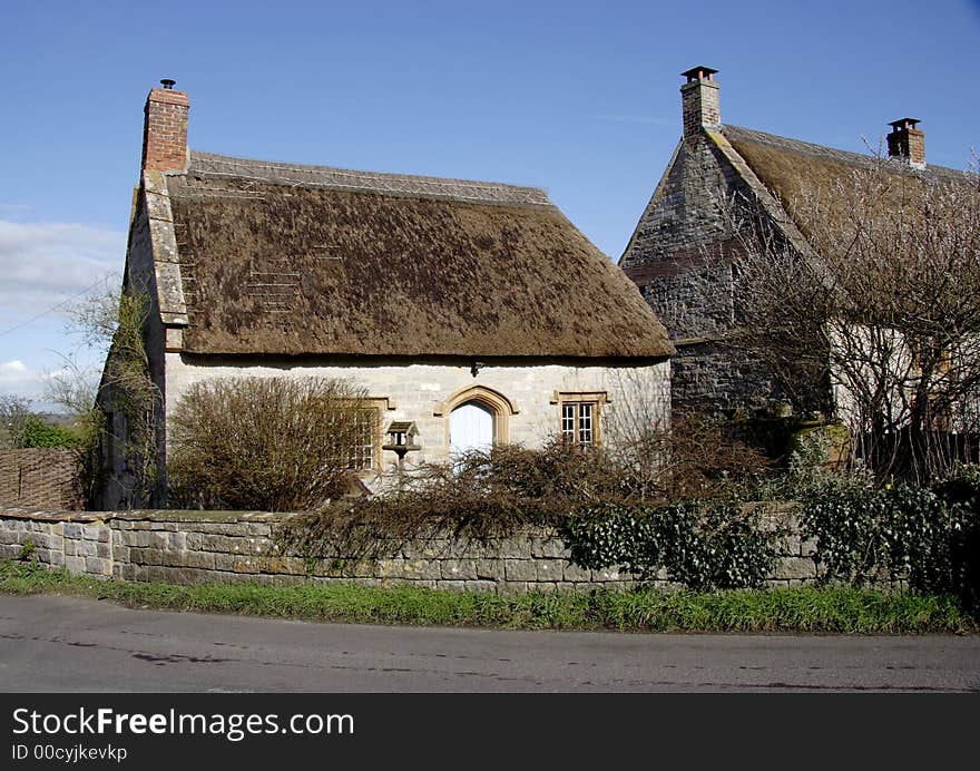 Thatched natural stone Medieval House in Rural England. Thatched natural stone Medieval House in Rural England