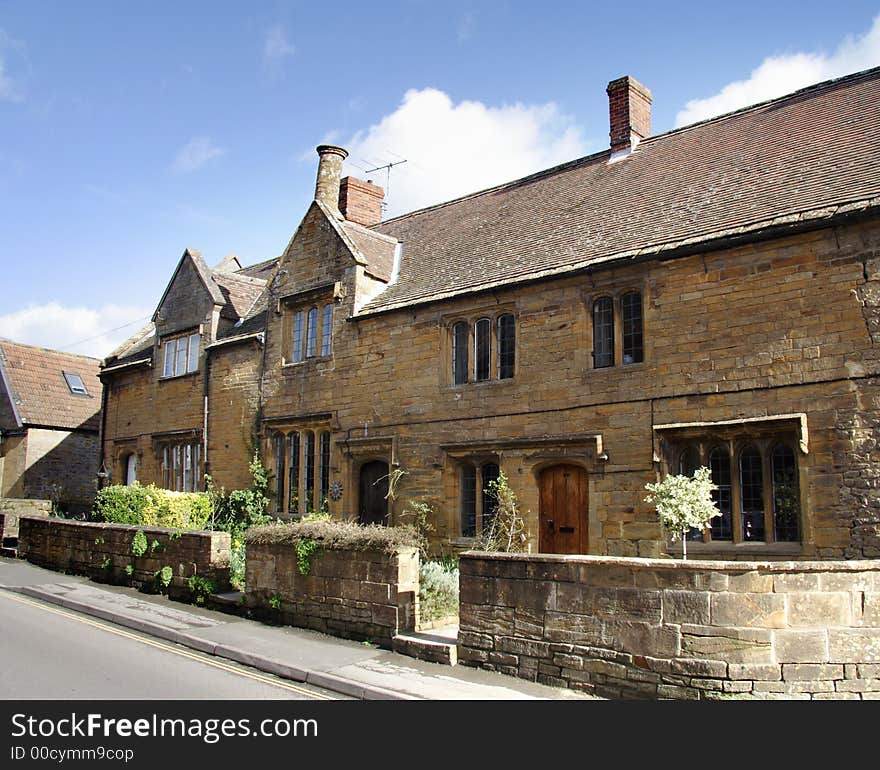 Winter sunshine on a Natural Stone Mullion windowed English Village Houses