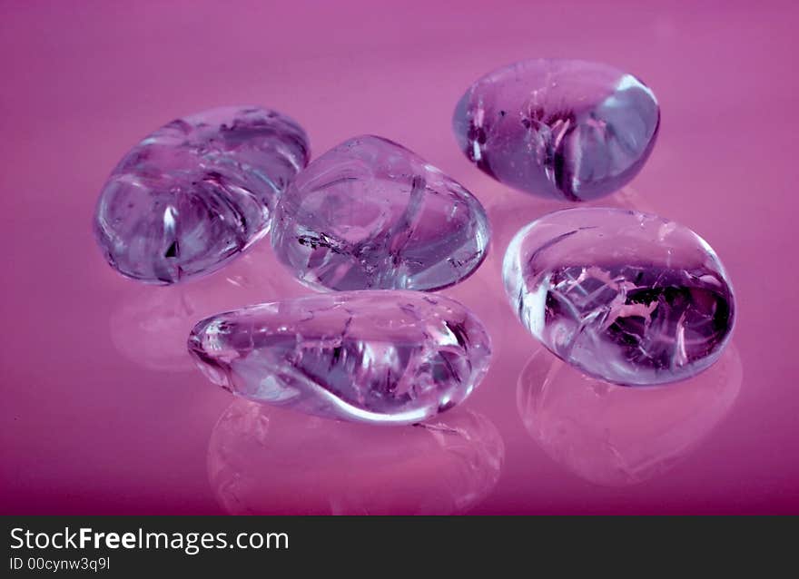 Wellness glass stones magenta background. Wellness glass stones magenta background