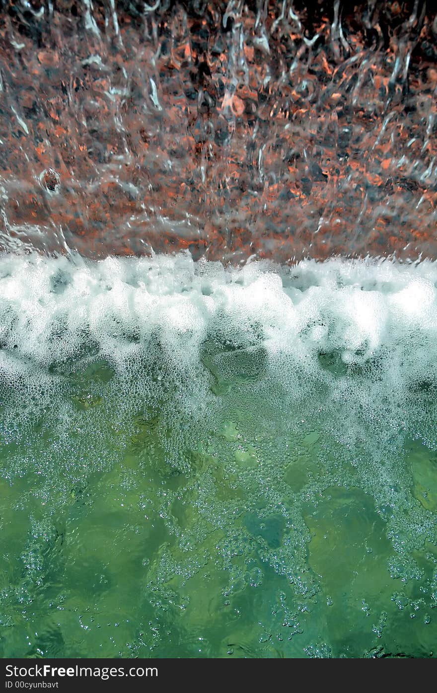 Water drop over edge. Close up shot.