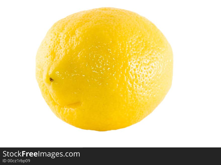 Close-up of lemon isolated on white background