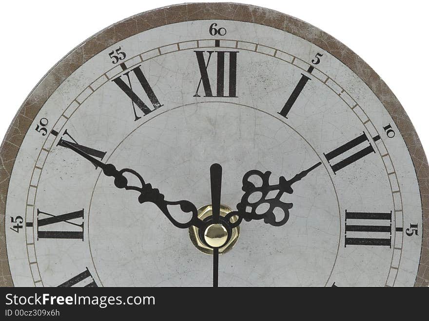 Antique clock face on a white background.