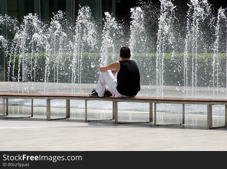 Yong man and fountain