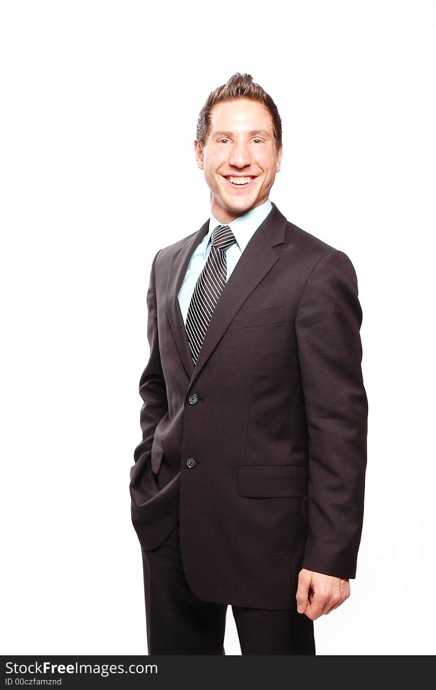 A businessman is smiling against white background