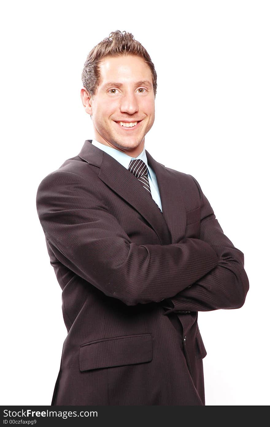 A businessman is smiling against white background