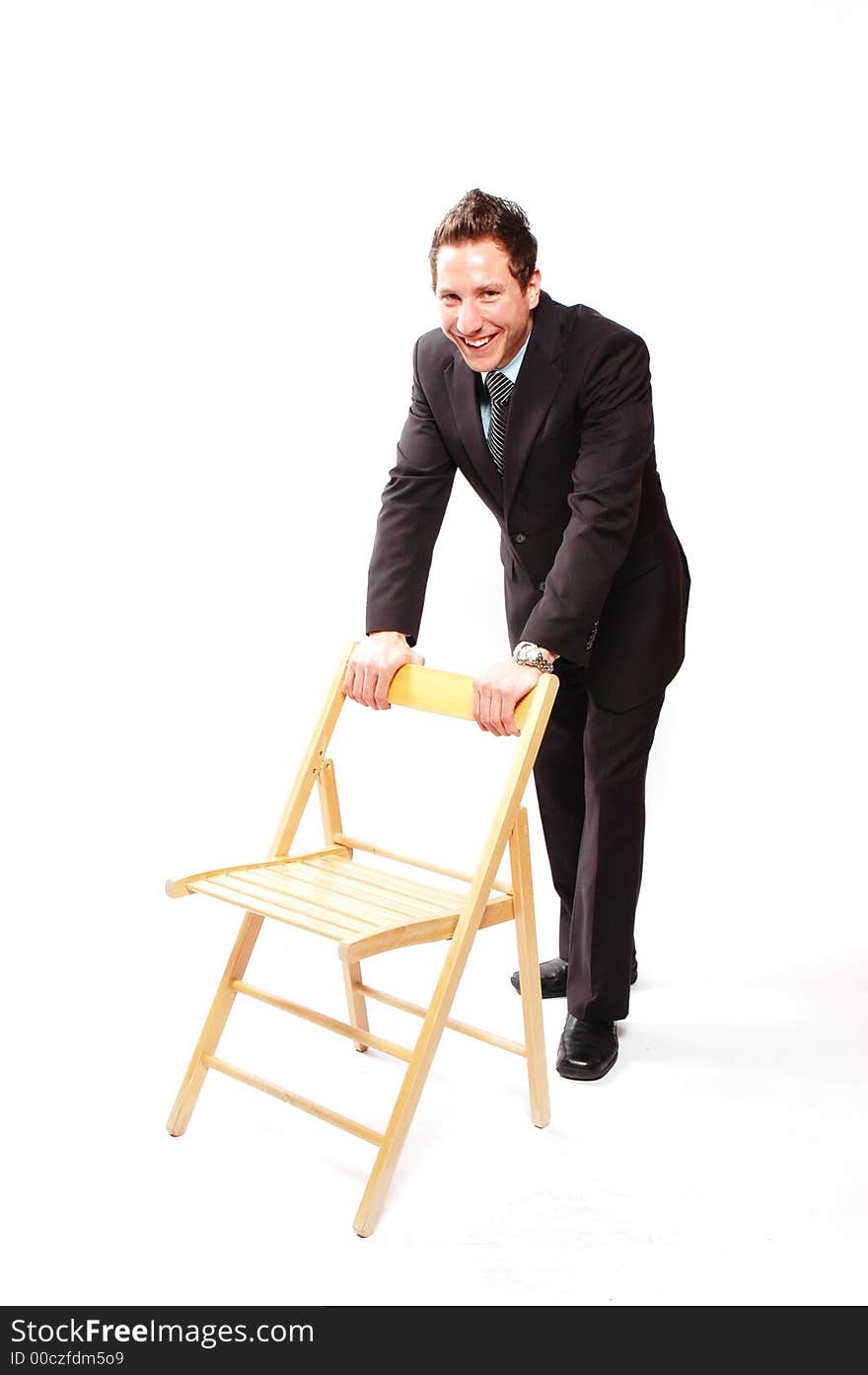 A businessman is smiling against white background