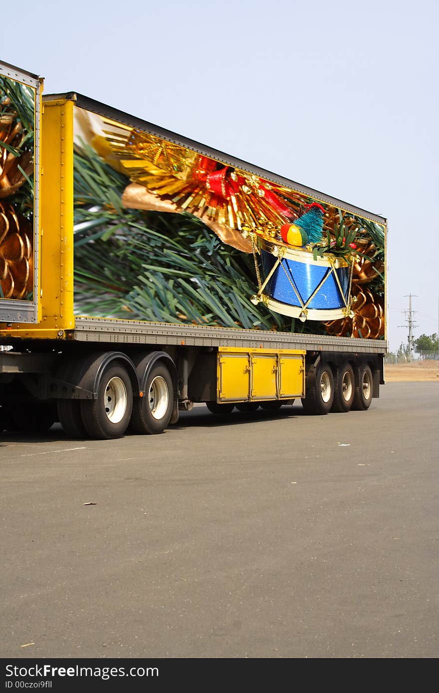 Semi trailer delivering christmas goods. Original photo on trailer by photographer. Semi trailer delivering christmas goods. Original photo on trailer by photographer