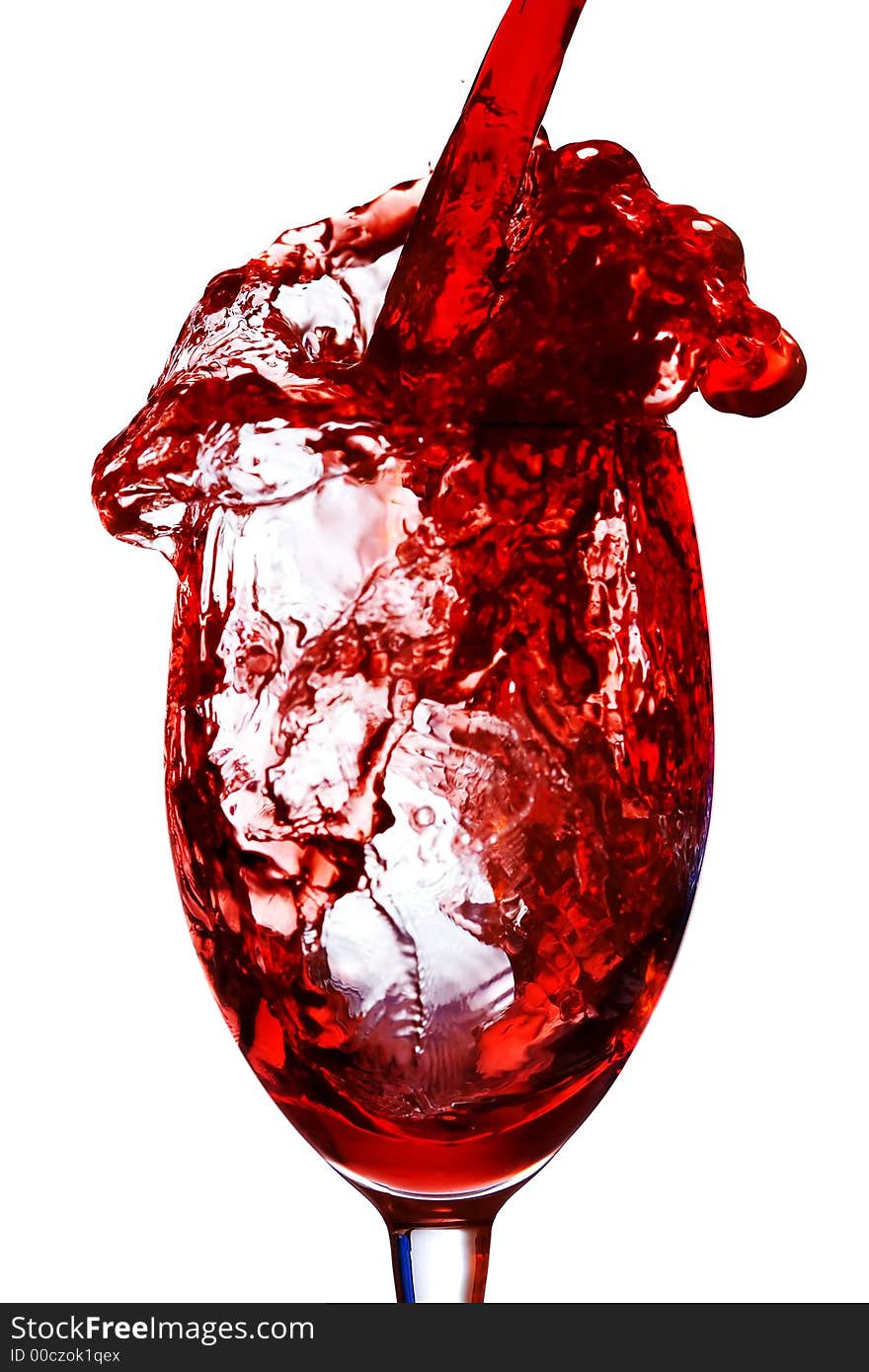 Red wine being poured into a wine glass