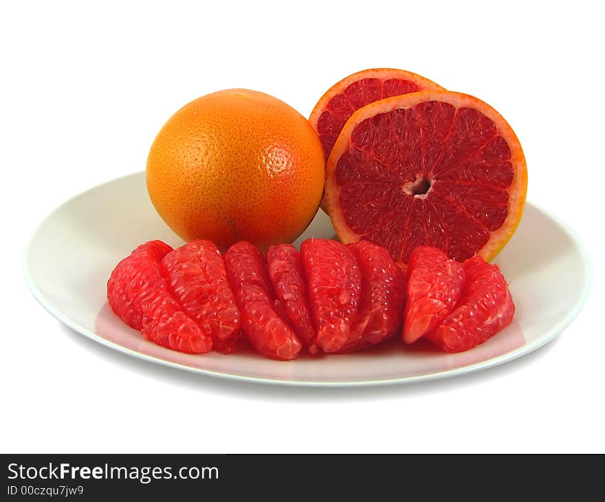 Red grapefruits, isolated on a white background. Red grapefruits, isolated on a white background.