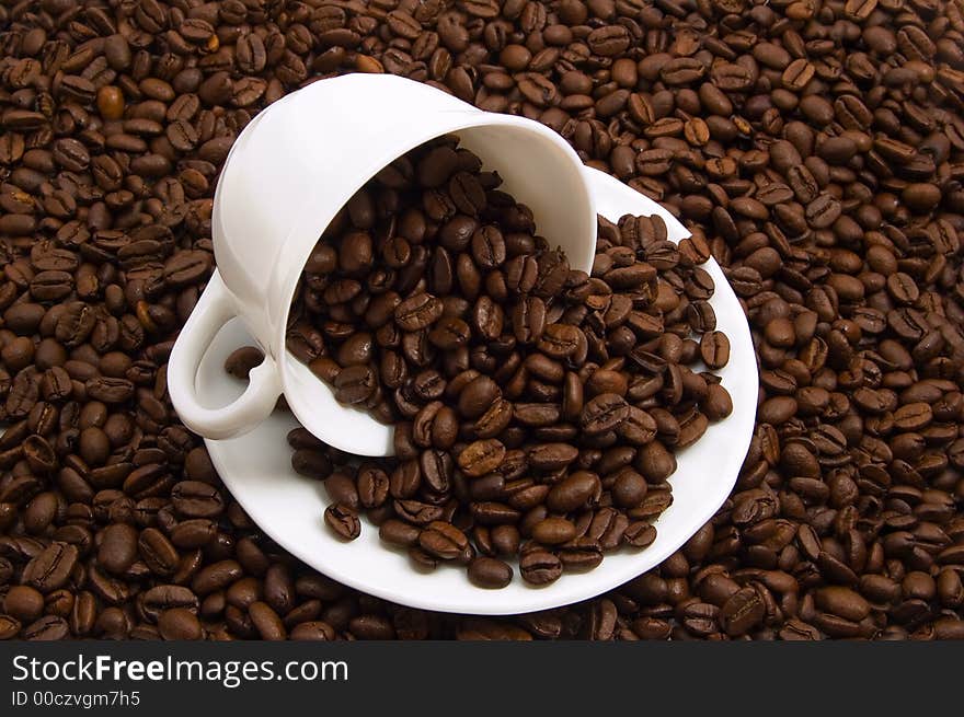 Cup and coffee beans