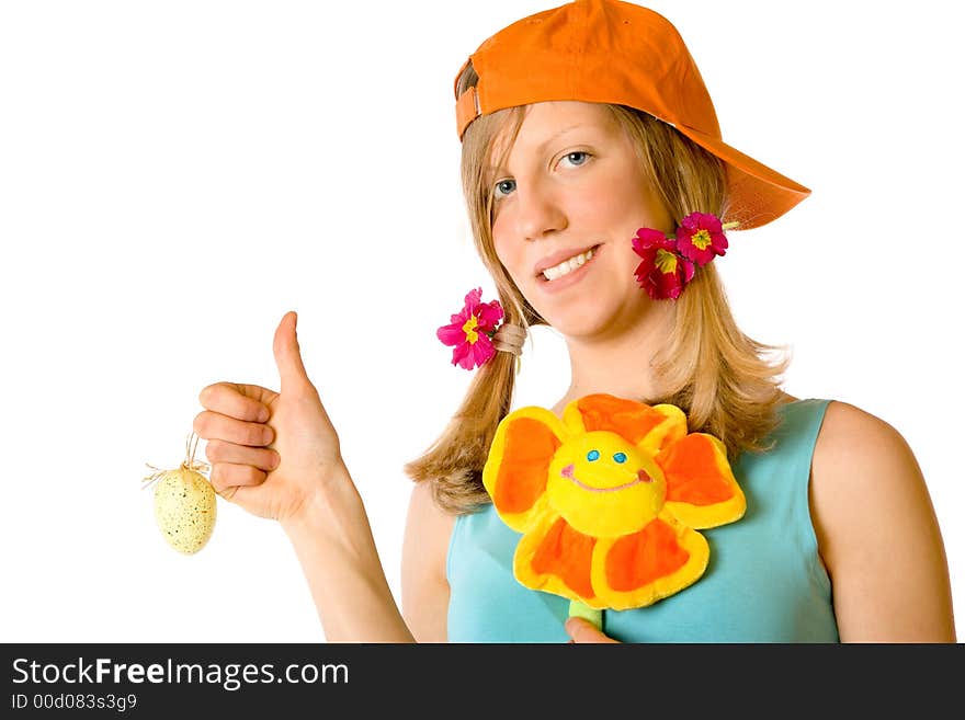 A beautiful girl with flowers and easter egg. A beautiful girl with flowers and easter egg.