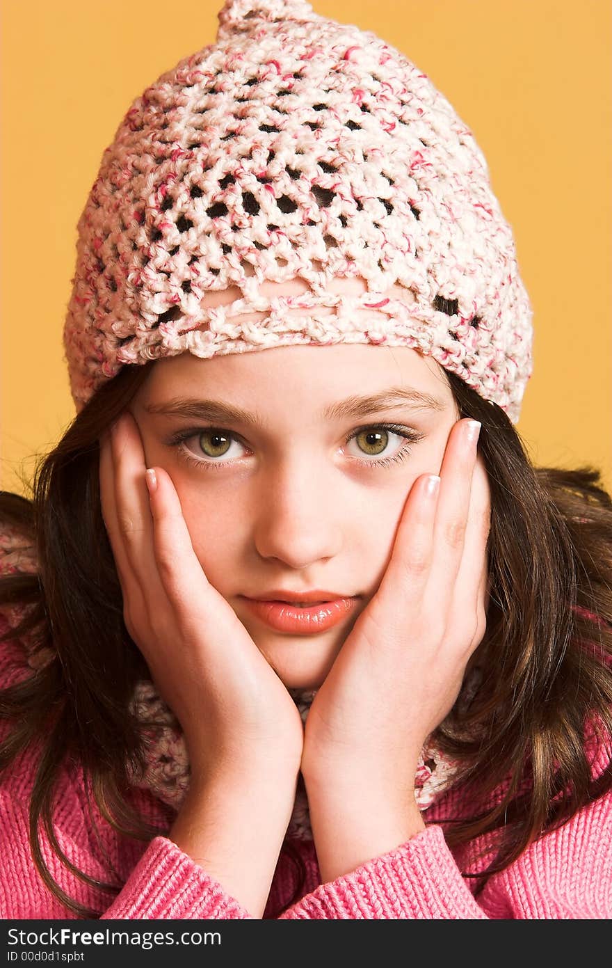 Portrait of pretty girl on yellow background