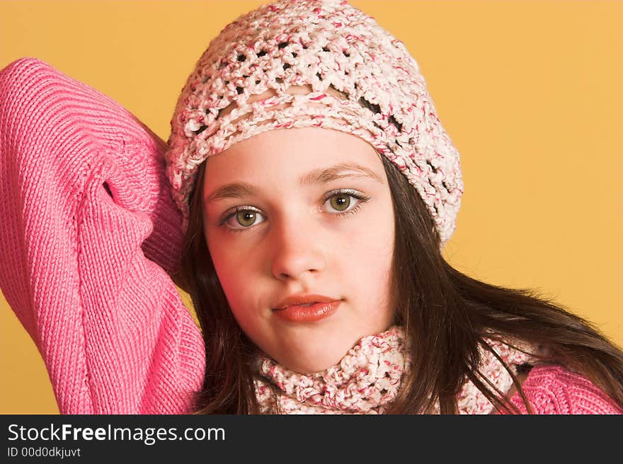 Portrait of pretty girl on yellow background