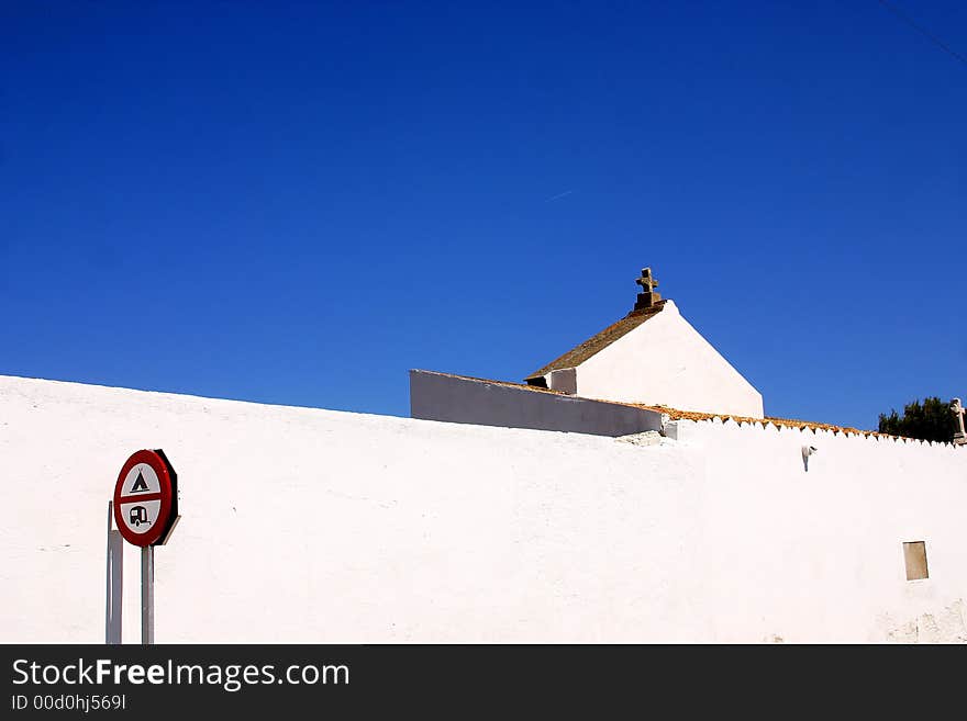 White wall  of the town of Cadaques, Catalonia, Spain, Europe. White wall  of the town of Cadaques, Catalonia, Spain, Europe