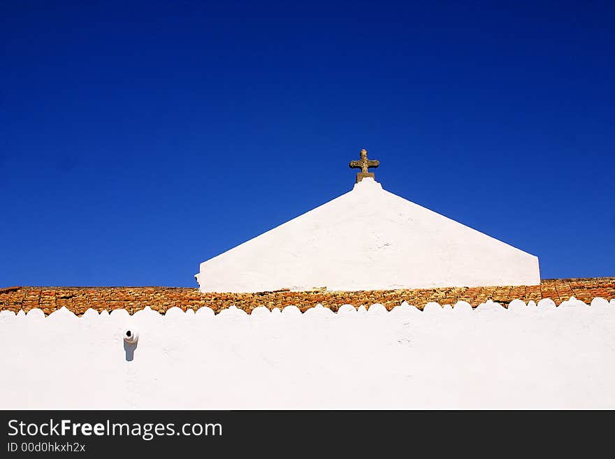 White wall and house of the town of Cadaques, Catalonia, Spain, Europe. White wall and house of the town of Cadaques, Catalonia, Spain, Europe