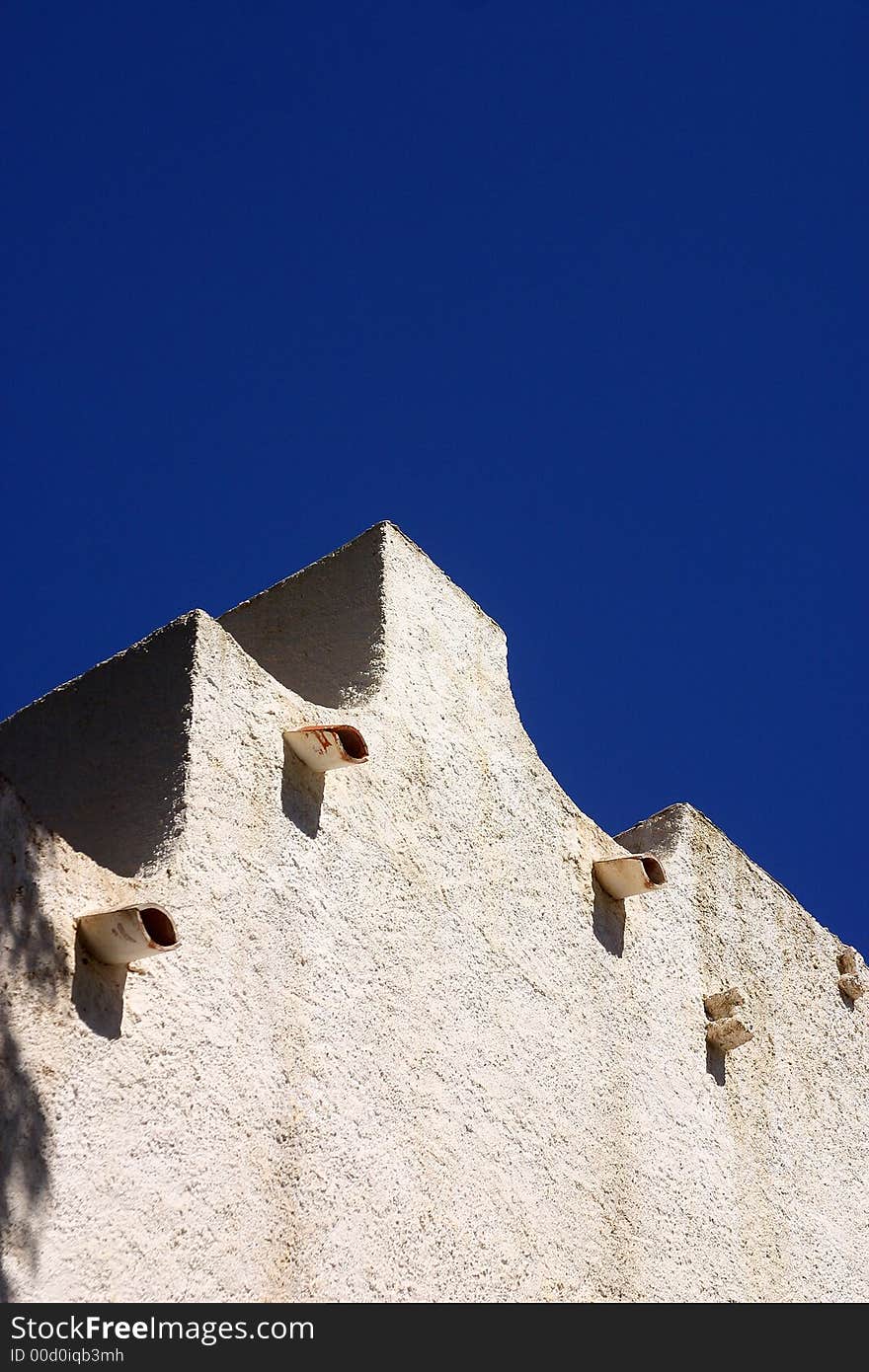 White building with wave like roof. White building with wave like roof