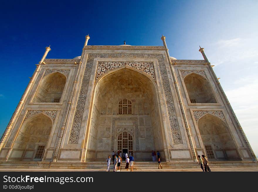 Close-up of Taj Mahal outside with deep blue sky. Close-up of Taj Mahal outside with deep blue sky