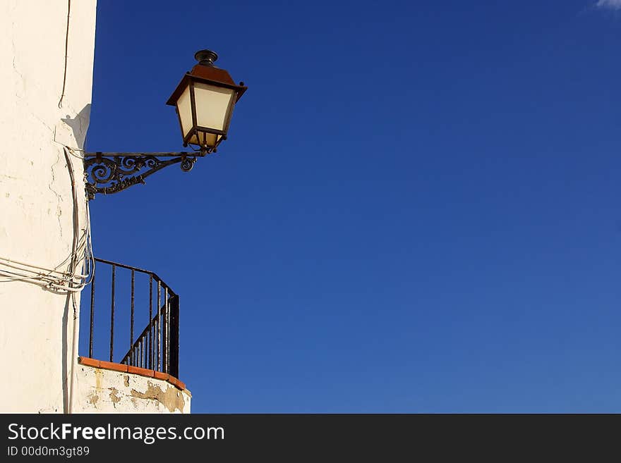 Old street light in the town of Cadaques, Catalonia, Spain, Europe. Old street light in the town of Cadaques, Catalonia, Spain, Europe