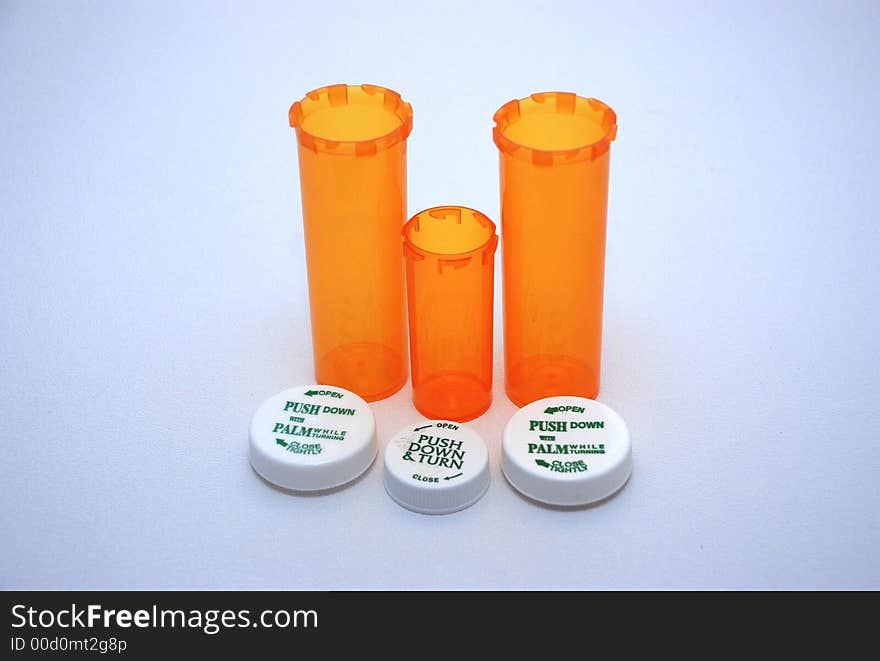 Three Empty Prescription Bottles manufactured for the pharmaceutical industry.