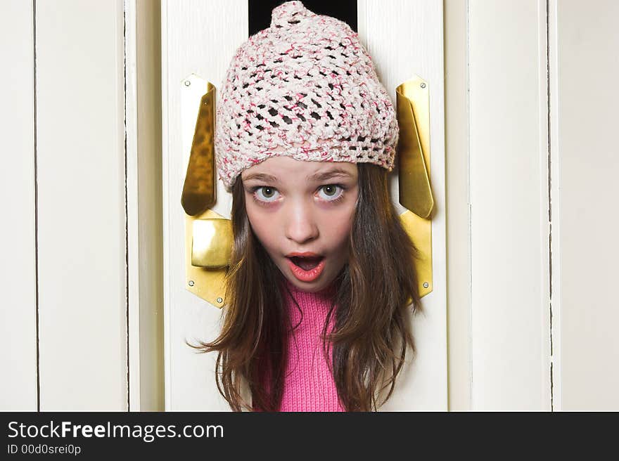 Girl head stuck in accordion door. Girl head stuck in accordion door