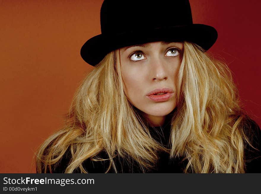 Beautiful fun loving woman with vintage bowler hat. Beautiful fun loving woman with vintage bowler hat