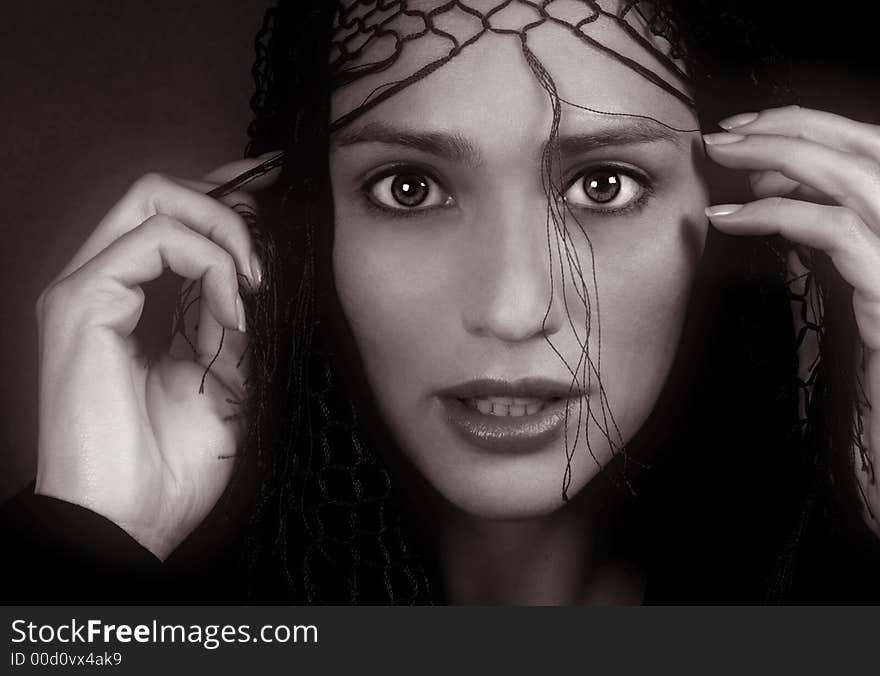 Beautiful Black and white image of Middle eastern woman with shawl. Beautiful Black and white image of Middle eastern woman with shawl