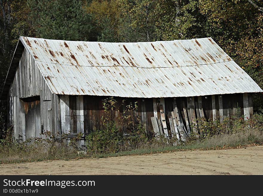 Old wooden rusty barn, Quebec, Canada. Old wooden rusty barn, Quebec, Canada