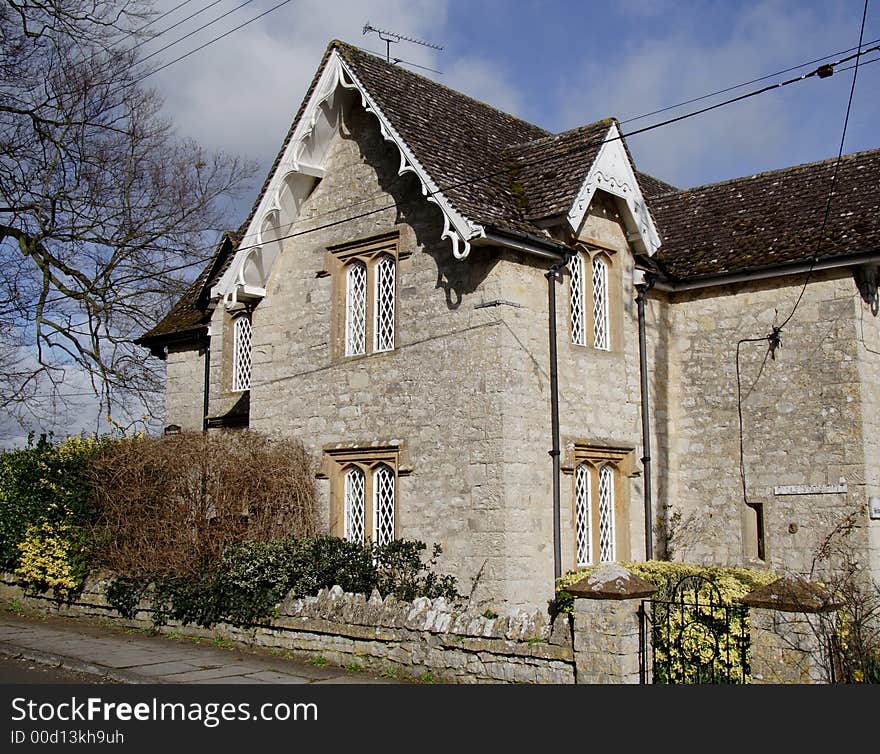 Winter sunshine on a Natural Stone English Village House. Winter sunshine on a Natural Stone English Village House