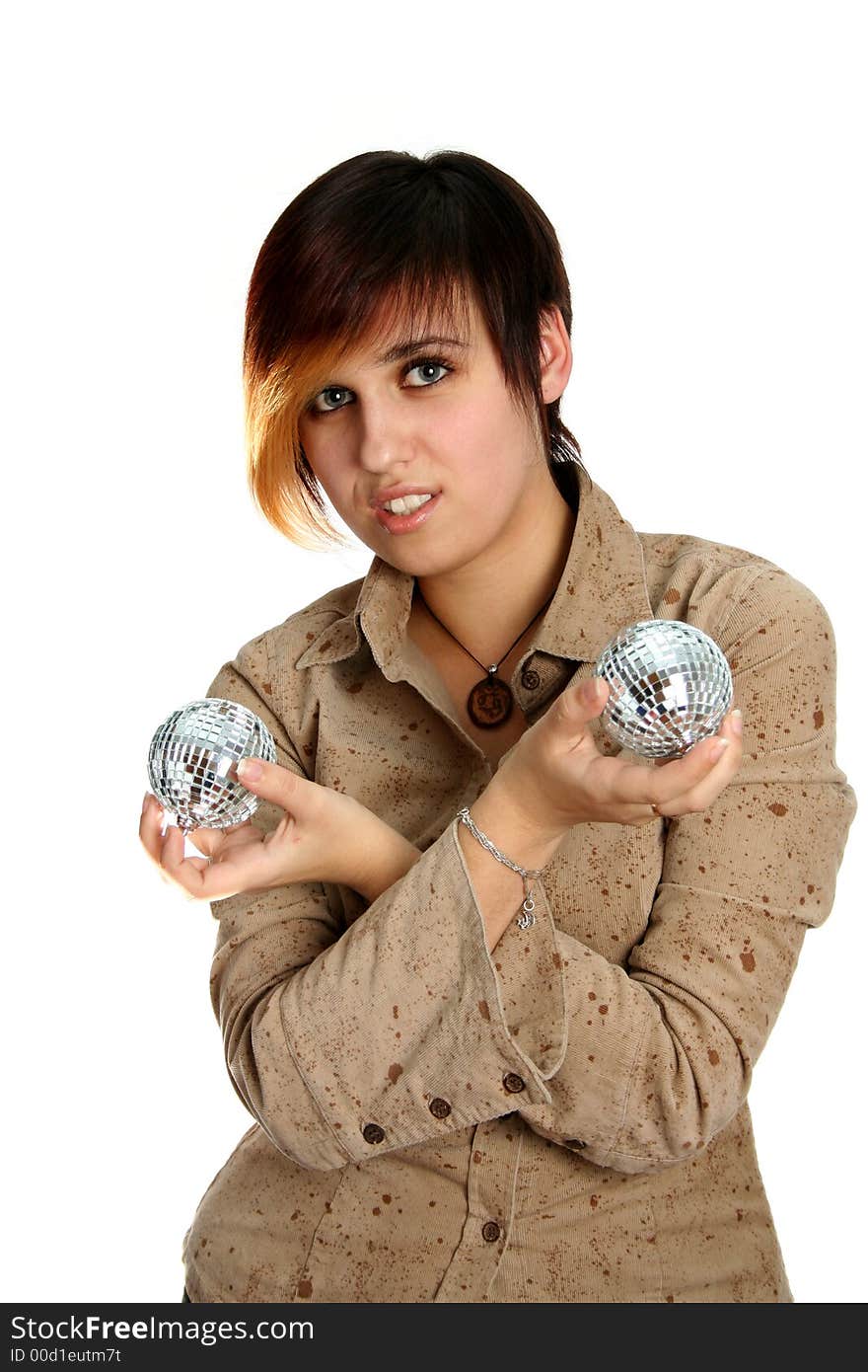 The Young Girl Holds Mirror Spheres In Hands